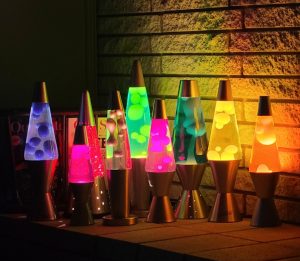Image of multiple glowing lava lamps about Boogie Shade lava lamp sun protection.